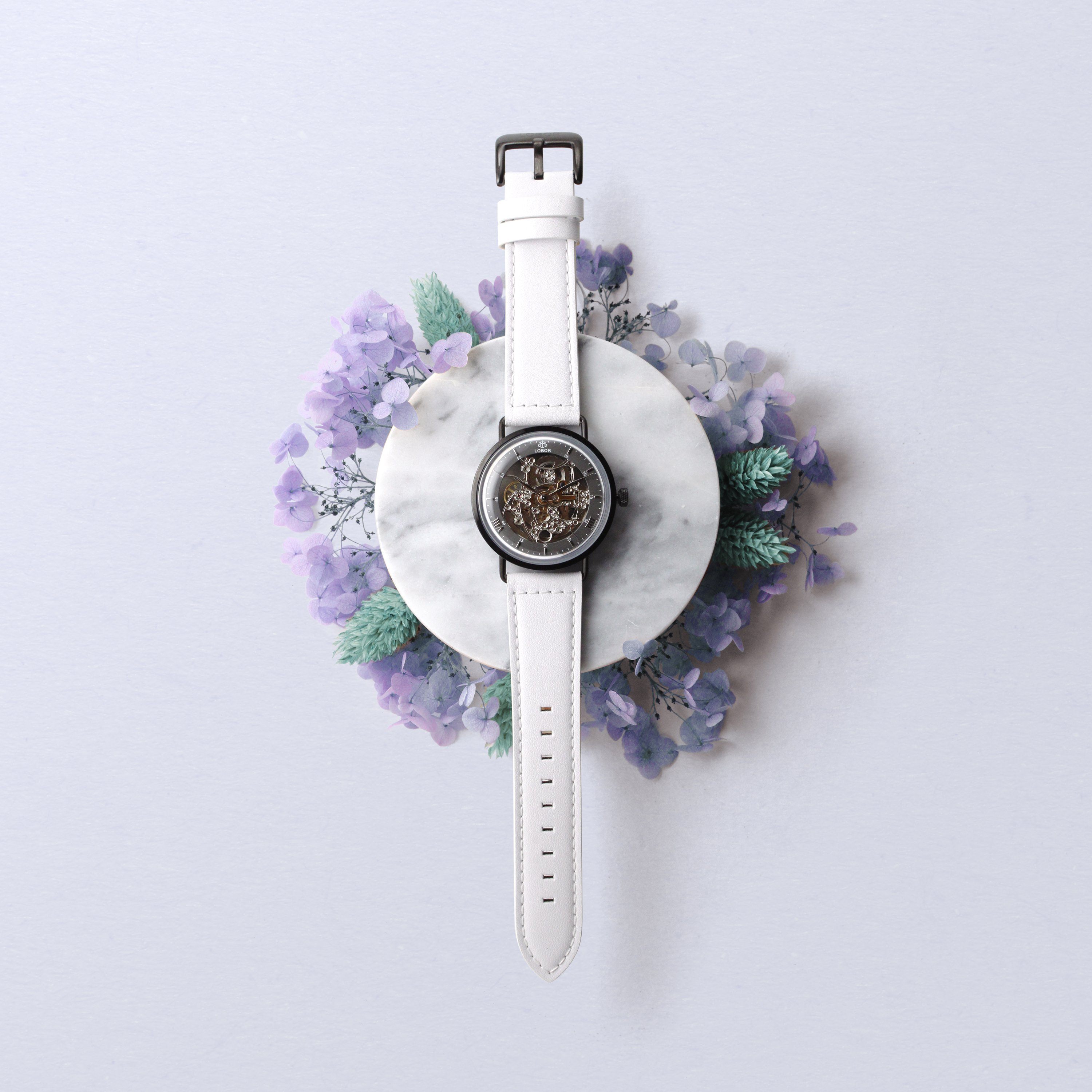 White skeleton watch